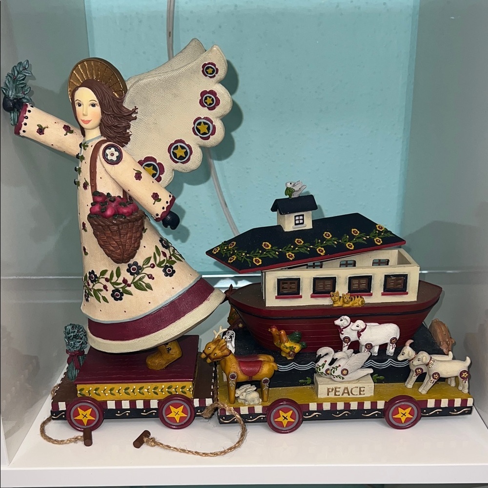 Angel pulling Noah’s Ark, hand painted resin by Kathy Killip for DEMDACO $45